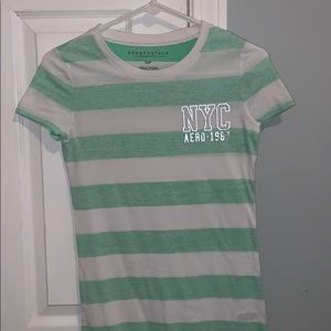 green and white tee shirt